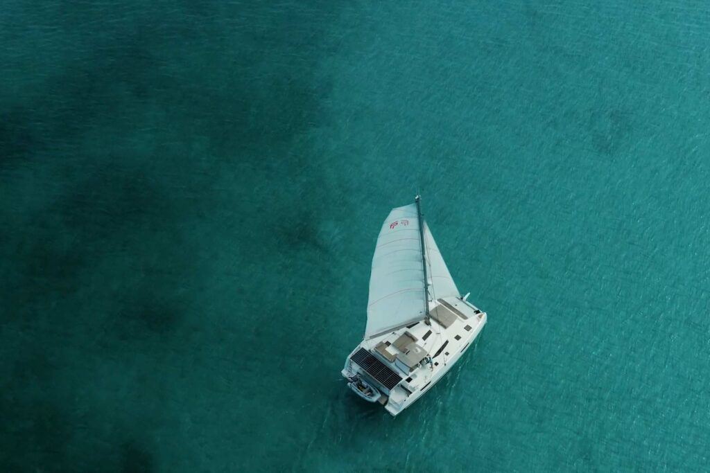 st petersburg brand photographer with a sailboat in the ocean