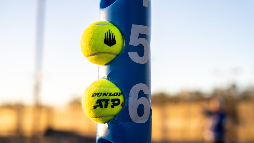 Junior tennis player using Dunlop racket at IMG Academy
