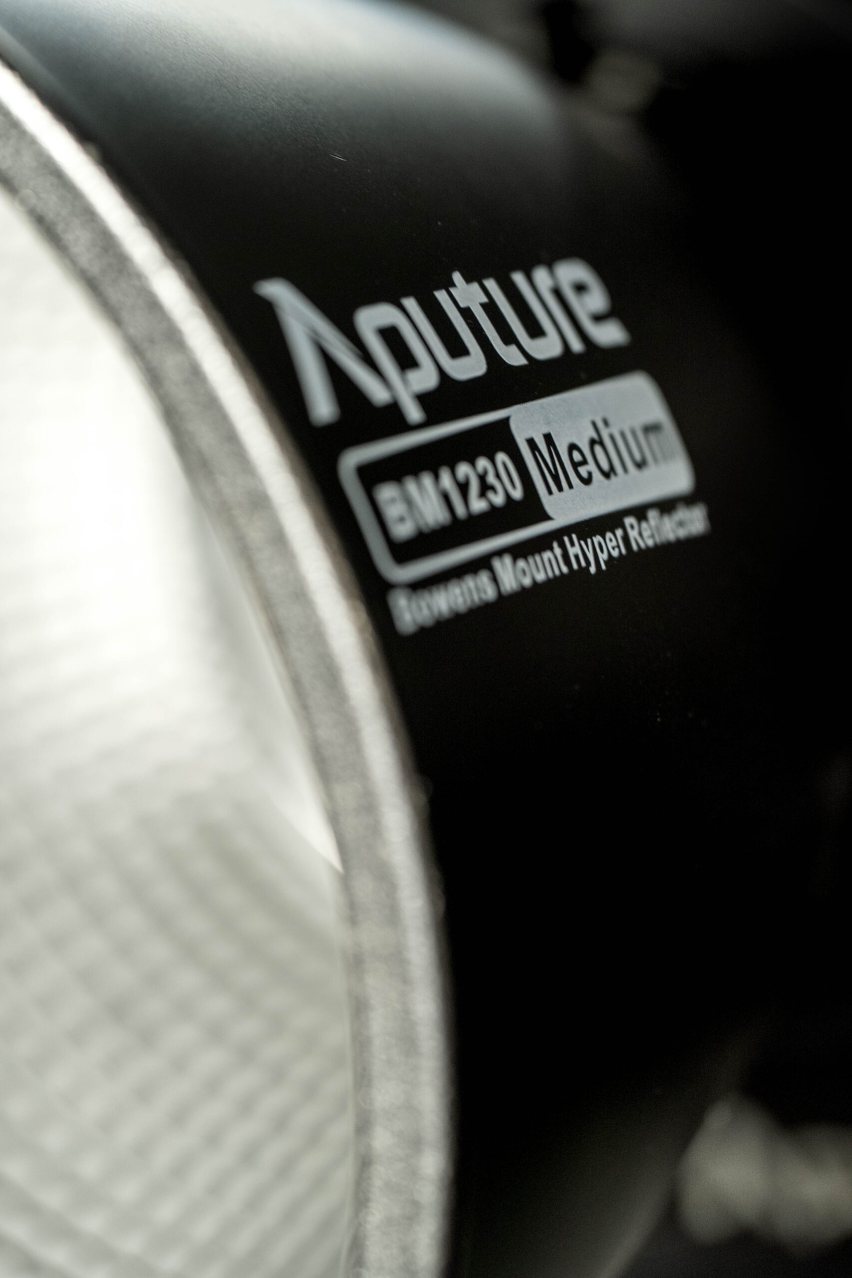 Aputure 1200d Pro mounted with light modifier and controlled by DMX console.