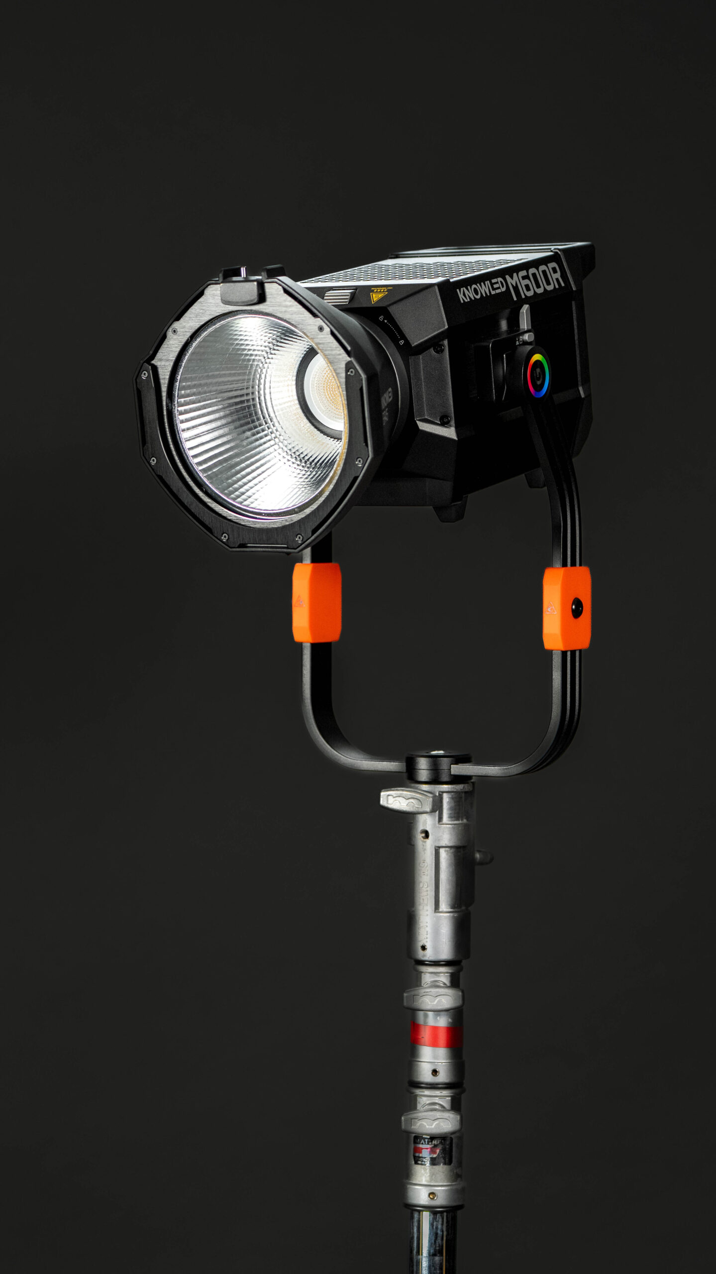 Godox Knowled M600R RGBWW COB LED Light mounted on C-stand with reflector.